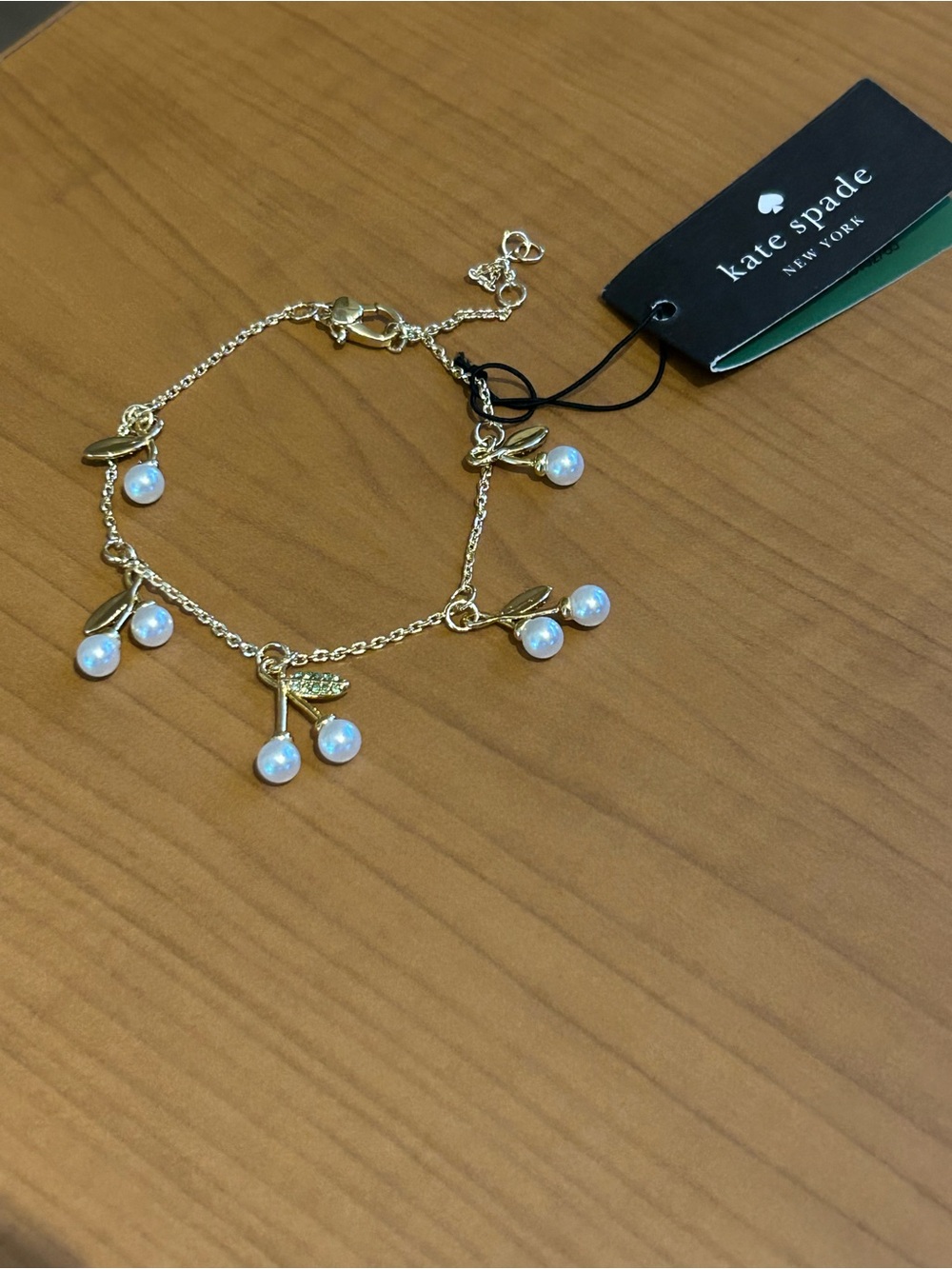 Kate Spade New York Cherie Cherry Charm Bracelet.